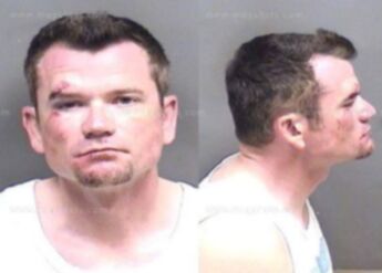 Christopher M Hawkins