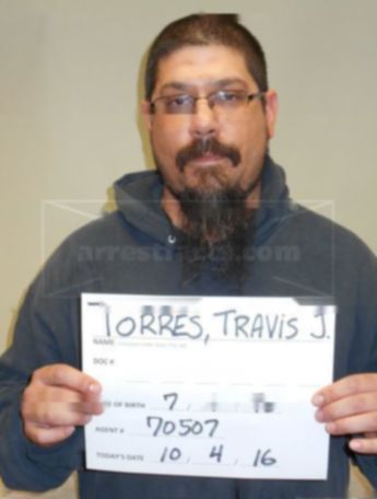 Travis J Torres