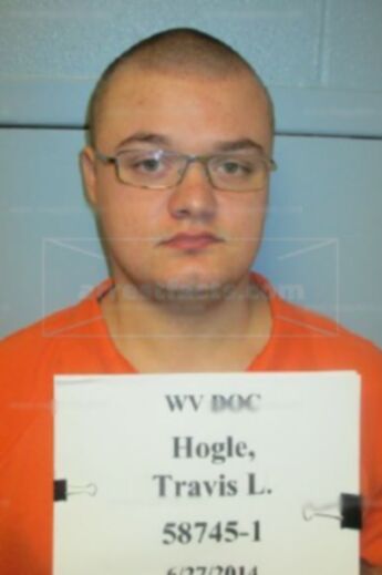 Travis L Hogle