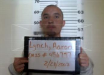Aaron J Lynch