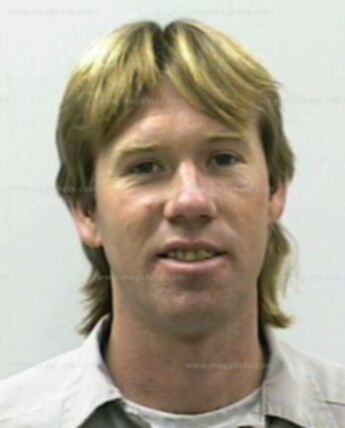 Timothy J Cooper