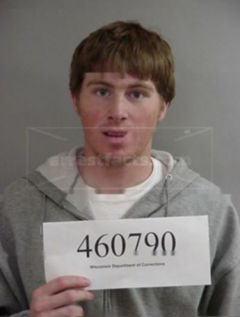 Travis J Rebischke
