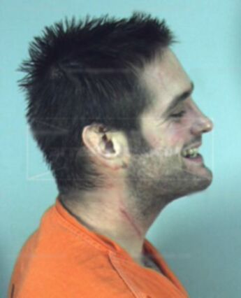 Travis L Harbison
