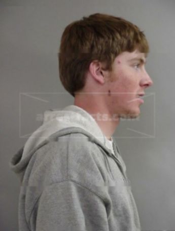 Travis J Rebischke