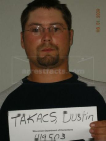 Dustin P Takacs