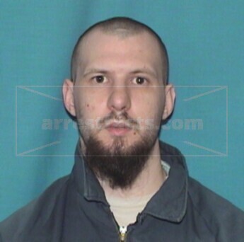 Travis M. Sharp