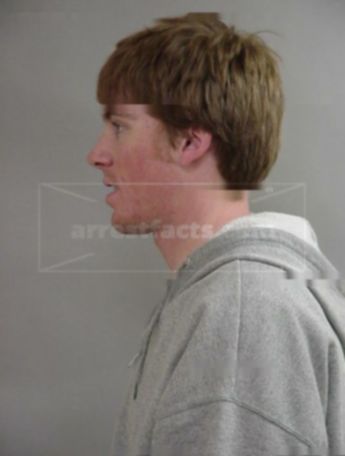 Travis J Rebischke