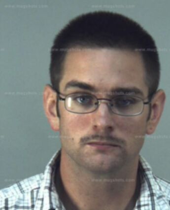 Travis L Harbison