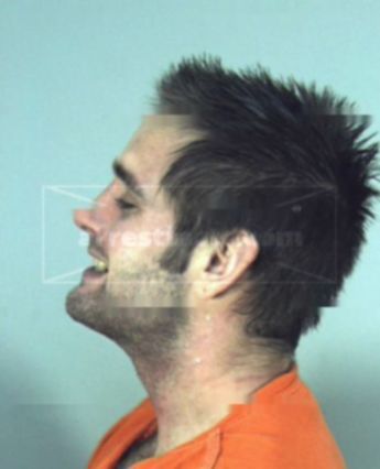 Travis L Harbison