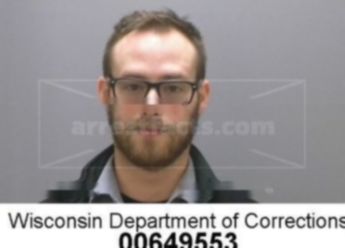 Adam J Mecomber