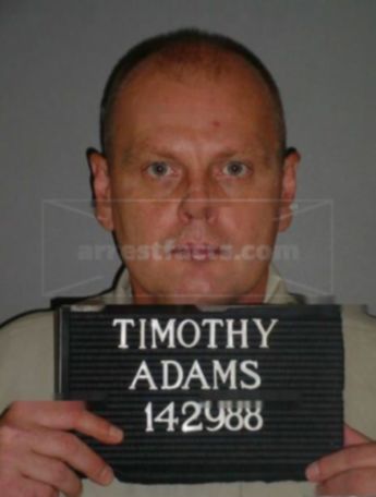 Timothy G Adams