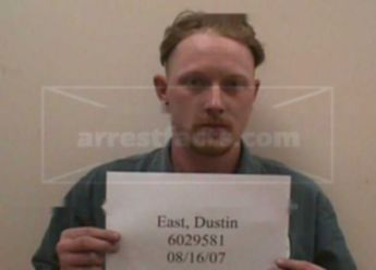 Dustin G. East